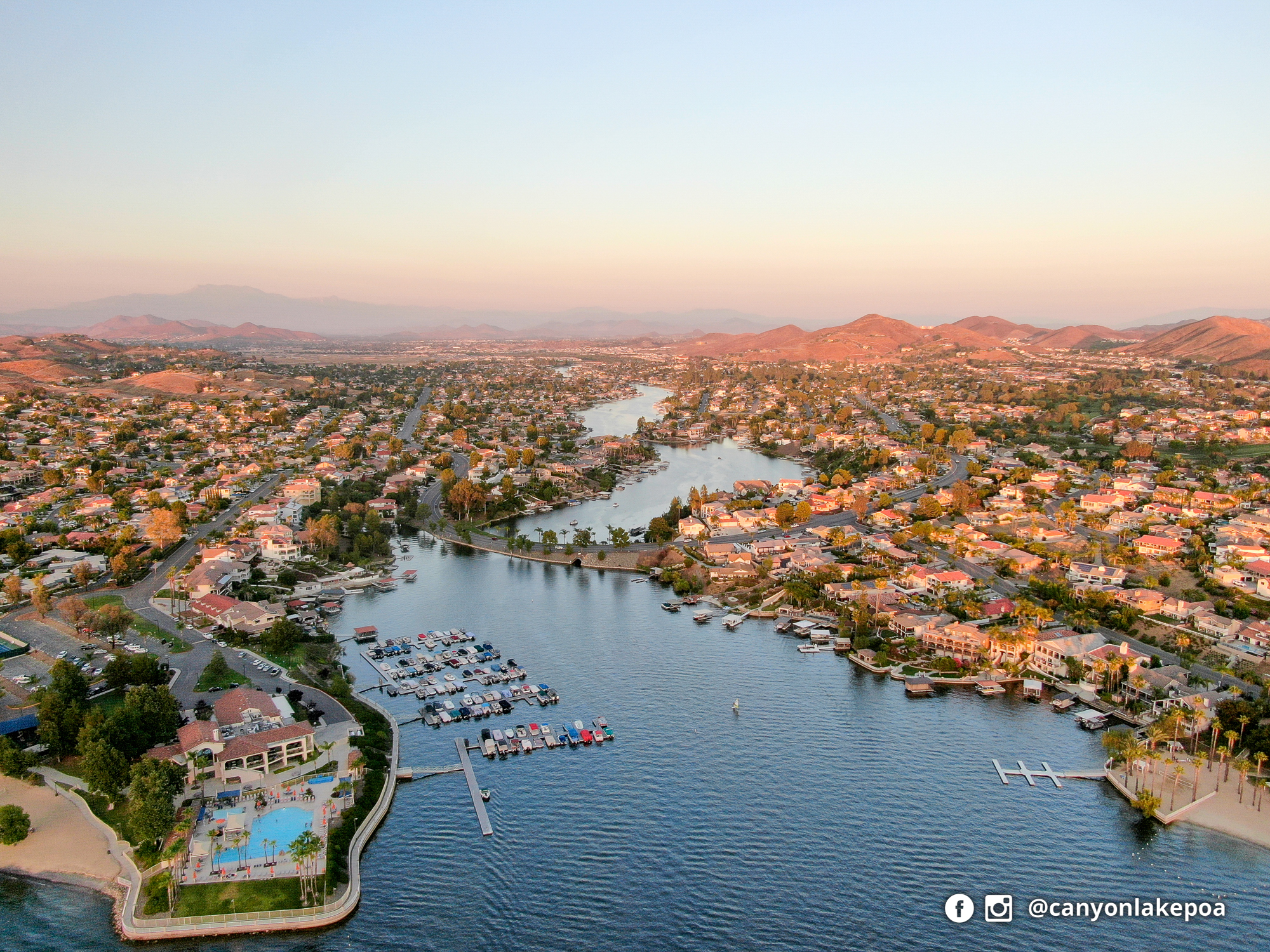 Aerial view of Canyon Lake, its waterways and surrounding waterfront homes.